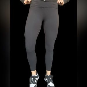 Lululemon black leggings size 6 with sheer cut out on lateral leg